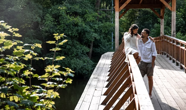 Adventurous couples trekking in the lush rainforest of Taman Negara - Best places to visit in Malaysia for couples